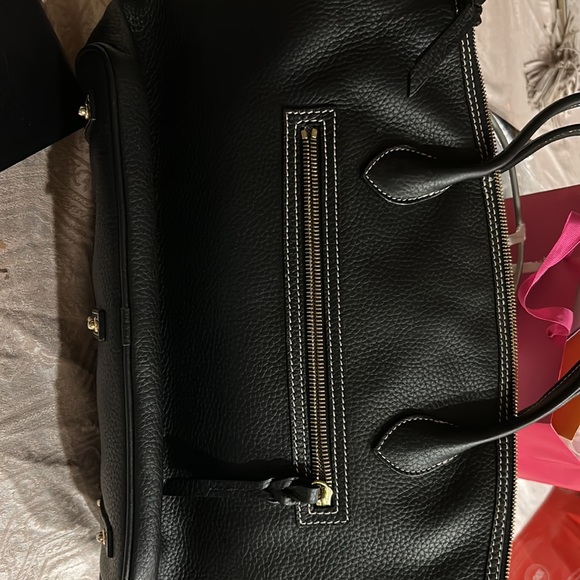 NWOT beautiful Dooney and Bourke hand bag . Black bag . Selling $65 - Picture 2 of 2